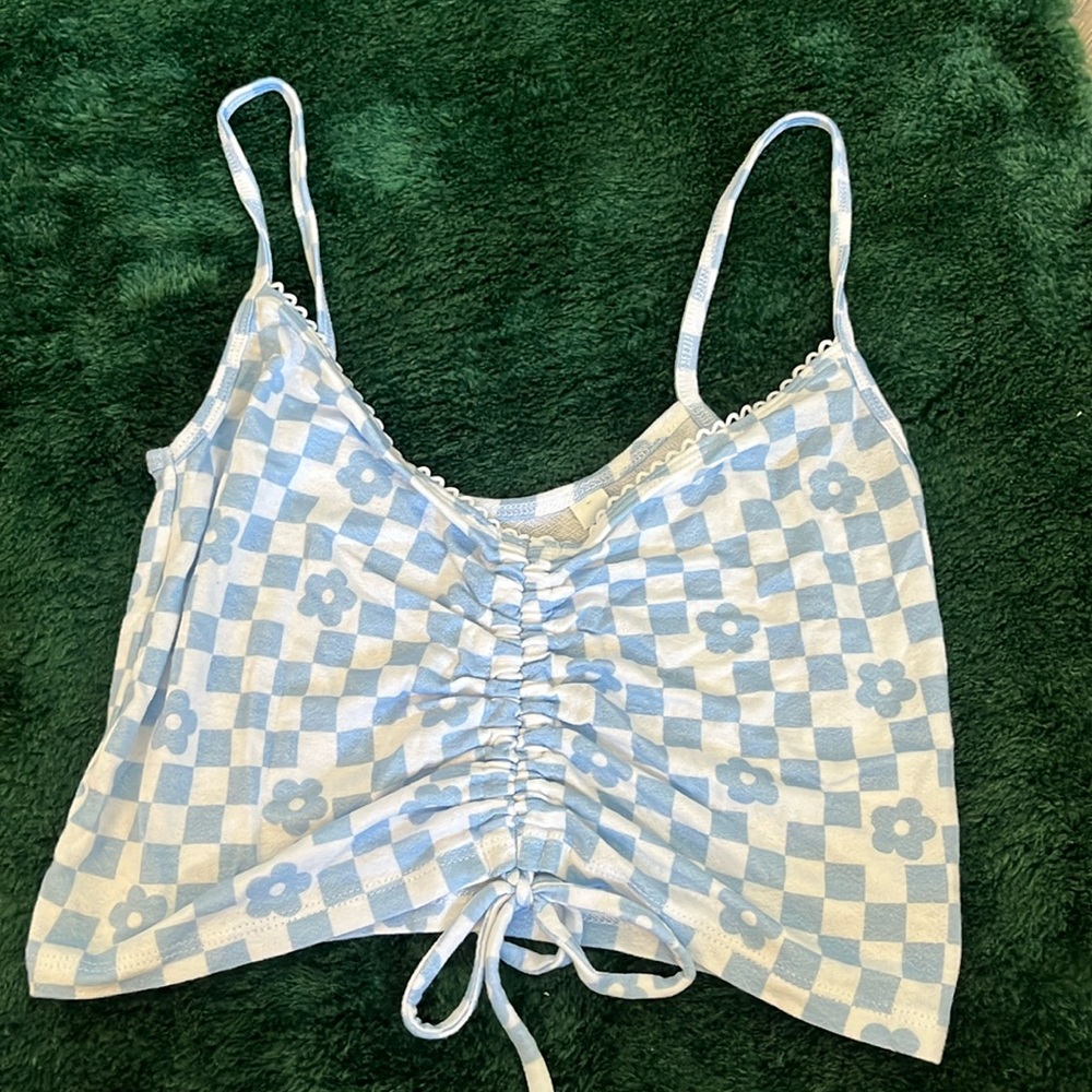 Stunning tank top from pacsun. Size small. Adjustable strings in the front.